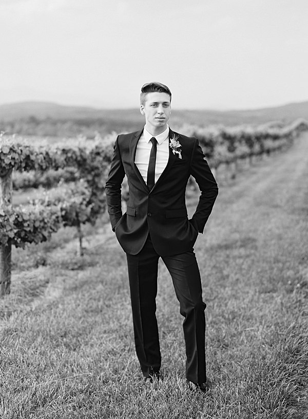 classic black and white groom portrait
