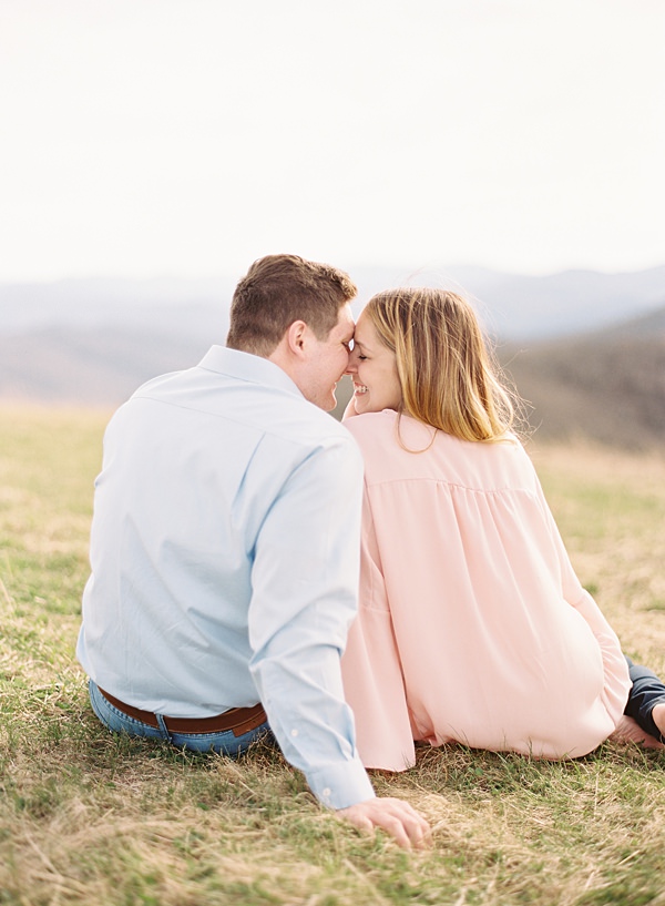 couple kissing in mountains
