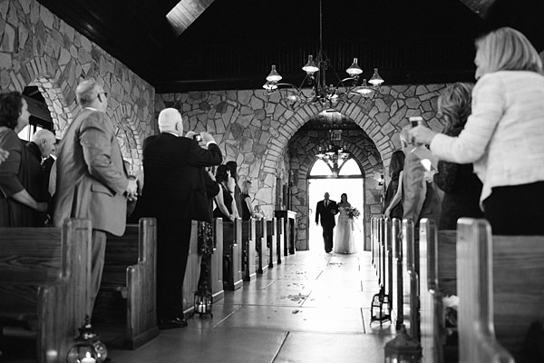 bride walking in chapel doors