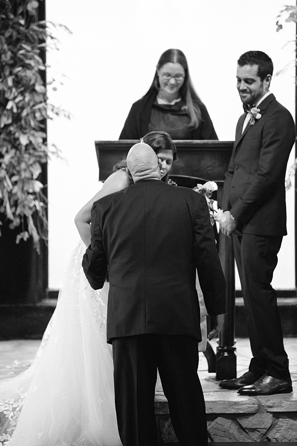father giving bride away