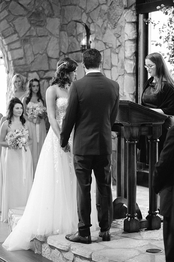 bride and groom saying vows